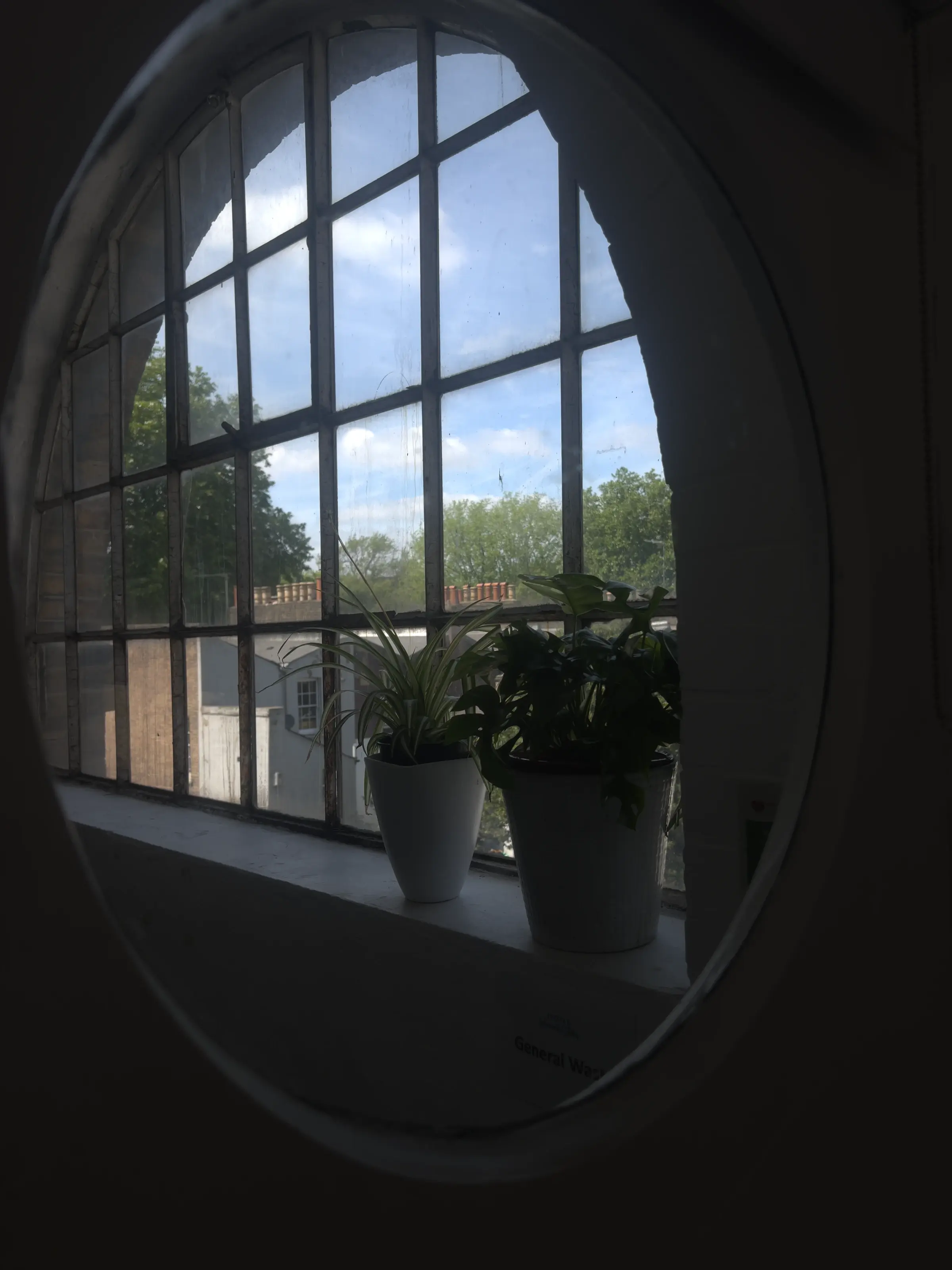 View across Studio 49 to the warehouse windows, natural light on the timber floor